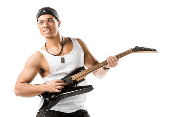 smiling mixed race male rock musician playing on electric guitar isolated on white - Fotoğraf, Görsel