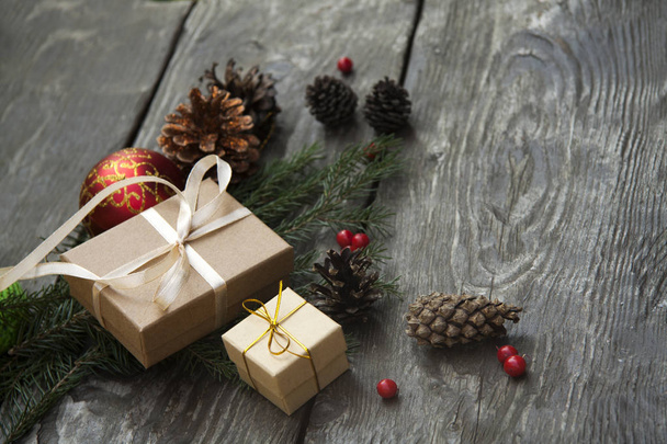 Christmas gift boxes on a rustic wooden background - Foto, Imagem