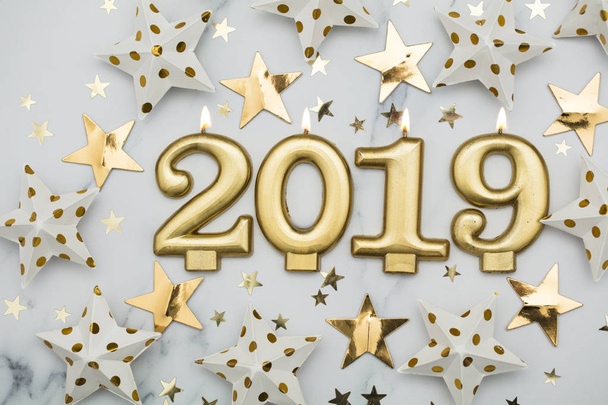 Happy new year 2019 with gold stars on a marble background - Photo, Image