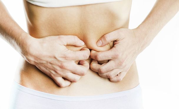 Bauchschmerzen, Berührung, Unterwäsche isoliert auf weißem Hintergrund - Foto, Bild