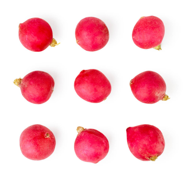 Radish lies on a white, isolated. The view from the top. - Photo, Image