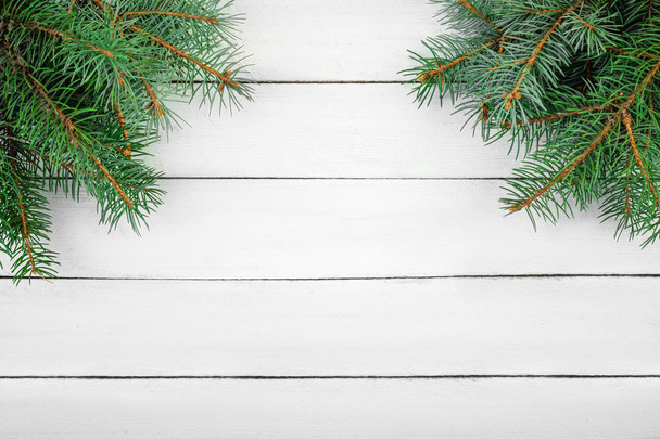 spruce branches on a wooden table - Photo, Image