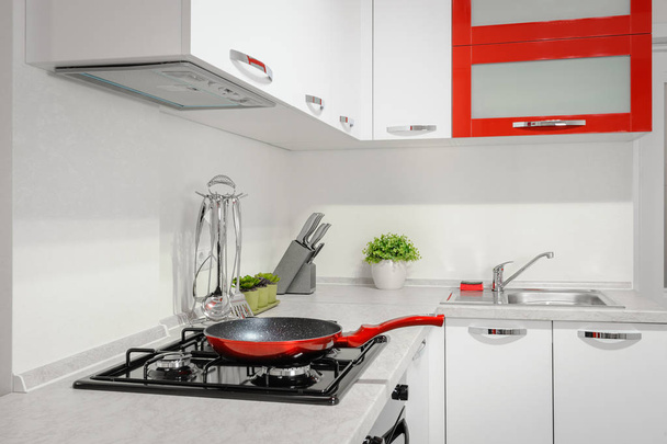 Modern red and white kitchen interior - Fotoğraf, Görsel