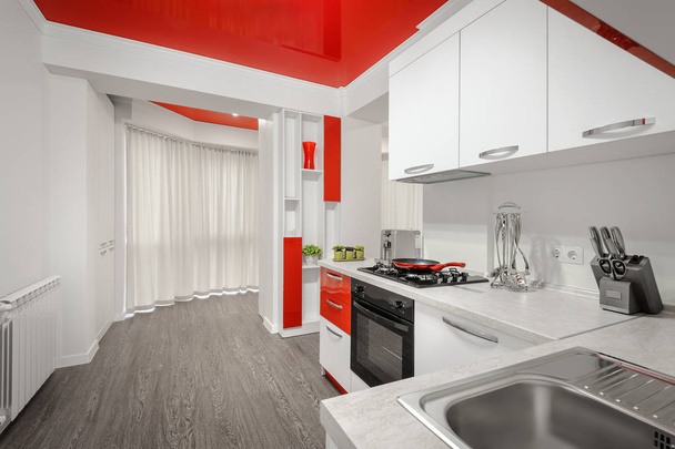 Nowoczesna kuchnia biało -czerwone wnętrze - Zdjęcie, obraz
