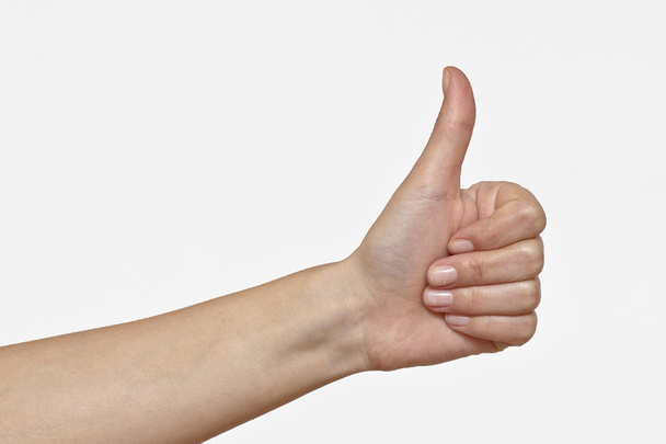 Mão feminina mostrando sinal OK. Isolado em branco. Conceito de sucesso
 - Foto, Imagem