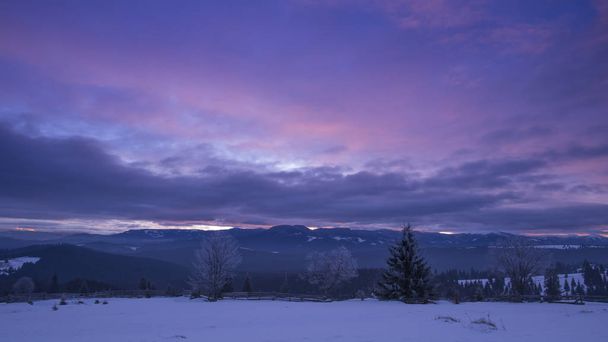 winter in mountains, majestic purple sky  - Photo, Image