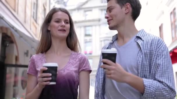 Young People Drinking Coffee And Walking At City Street - Кадри, відео