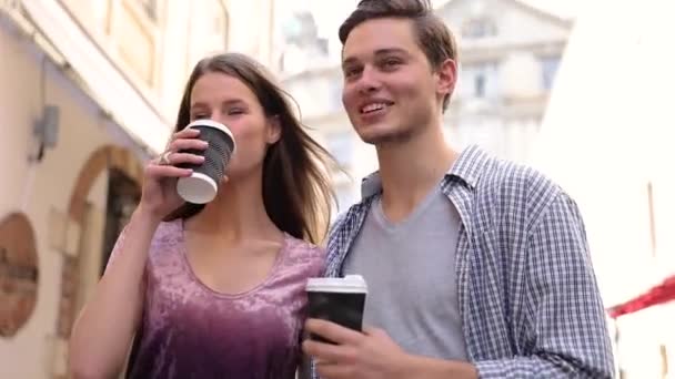 Young People Drinking Coffee And Walking At City Street - Felvétel, videó