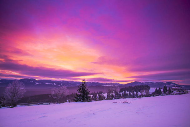 Amazing snowy mountains at dusk, winter landscape. - Фото, зображення
