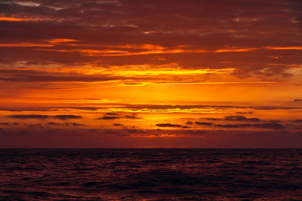 sunset over the sea - Фото, изображение