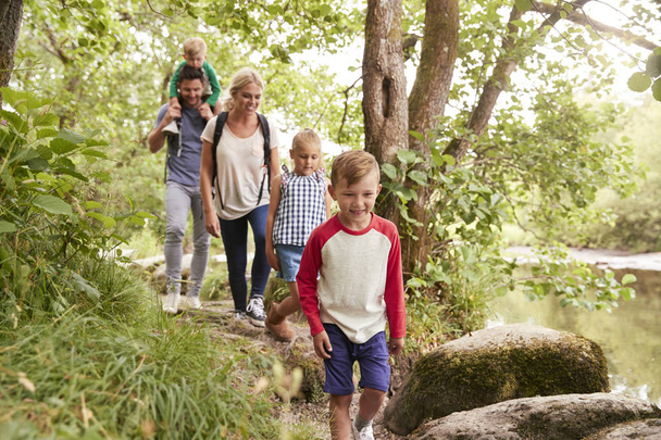 Family Hiking Along Path By River In UK Lake District - Fotoğraf, Görsel