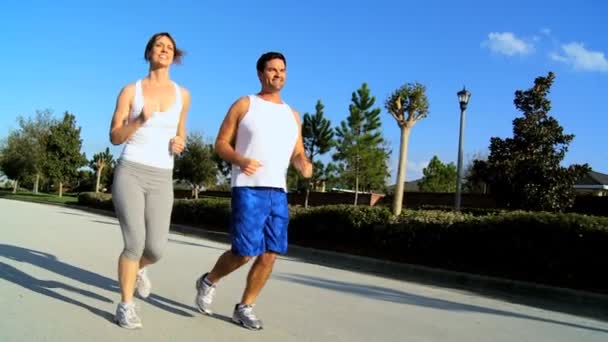 Exercício de corrida de casal saudável
 - Filmagem, Vídeo