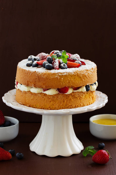 Genoise (cake) with cream, berries and lemon cream. - Fotografie, Obrázek
