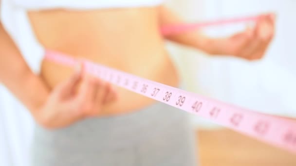Young Female Checking Body Size Loss - Footage, Video