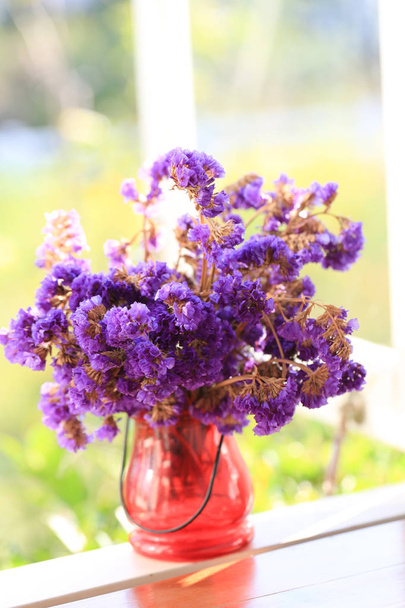 Limonium sinuatum Statice Salem flowers, violet tiny flowers in vase, closeup  - Photo, Image