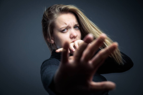 Young woman being a domestic violence victim - Photo, Image