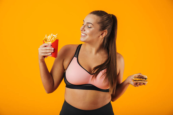 Portrait of a happy overweight fitness woman - Fotoğraf, Görsel