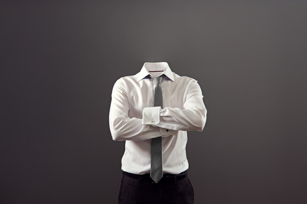 invisible man standing with folded arms - 写真・画像