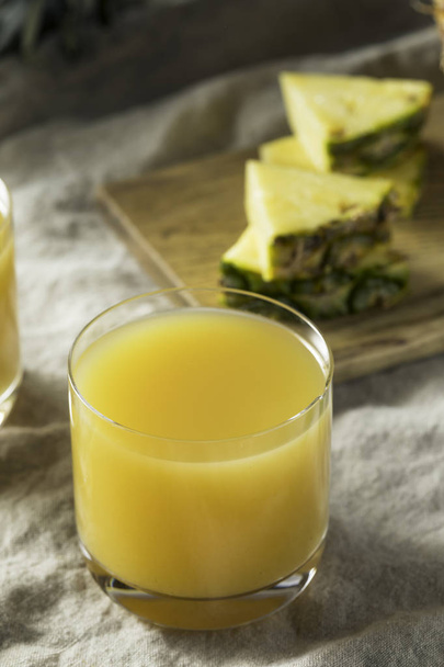 Raw Orange Pineapple Juice in a Glass - Φωτογραφία, εικόνα