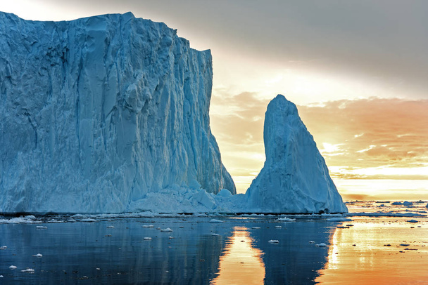 Arctic Icebergs on the Arctic Ocean in Greenland - Photo, Image