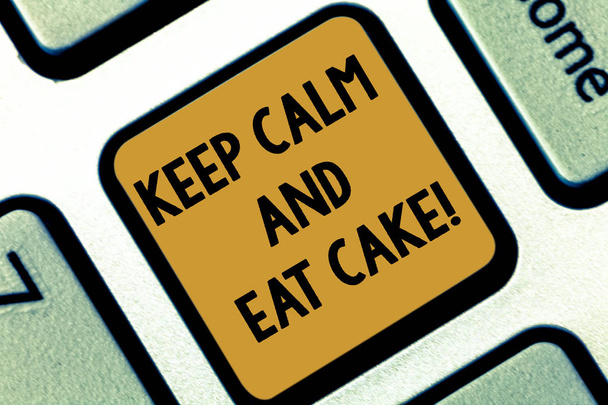 Text sign showing Keep Calm And Eat Cake. Conceptual photo Relax and enjoy eating a sweet food dessert Keyboard key Intention to create computer message pressing keypad idea. - Photo, Image