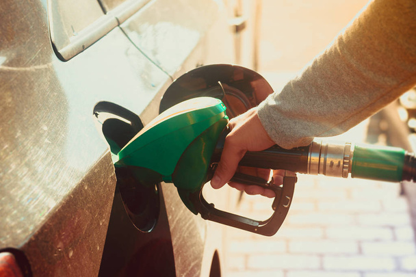 man fueling a car, closeup - Zdjęcie, obraz