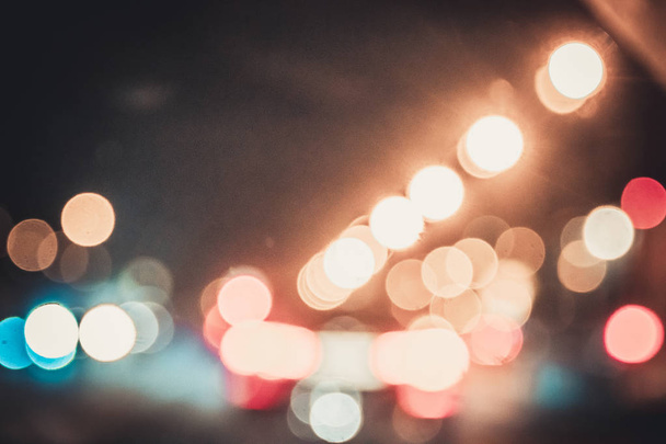 Abstract bokeh background of city street lights at night - Fotó, kép