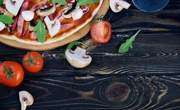 Appetizing and tasty homemade pizza on the table - Valokuva, kuva