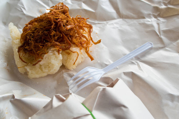 Sticky rice and Roast pork in paper wrap - Photo, Image