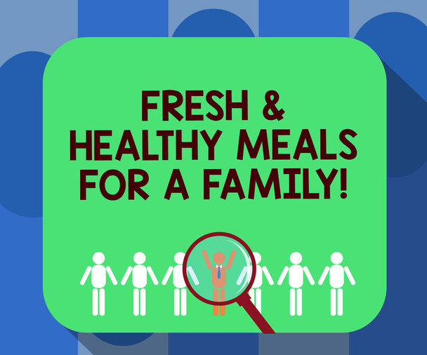 Handwriting text writing Fresh And Healthy Meals For A Family. Concept meaning Good nutrition taking care of health Magnifying Glass Over Chosen Man Figure Among the Hu analysis Dummies Line Up. - Photo, Image