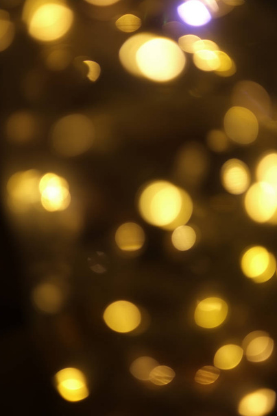 BLURRED LIGHTS AND BOKEH , FESTIVE DESIGN, BACKGROUND FOR CHRISTMAS AND HAPPY NEW YEAR. - Photo, Image