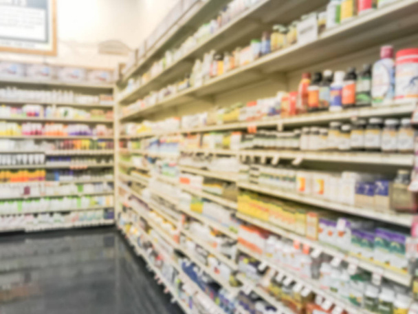 Variedad abstracta borrosa de productos de vitaminas y suplementos en exhibición en la tienda de comestibles en Texas, Estados Unidos
 - Foto, Imagen