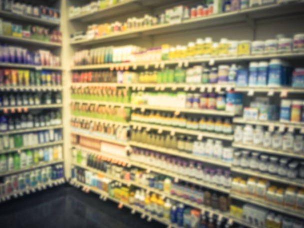 Старовинні тони розмита абстрактних різні вітамінно-доповнення продукти на дисплеї на продуктовий магазин в Техасі, Америка - Фото, зображення