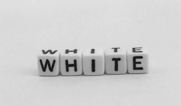 the word from dice "white" on a white background - Photo, Image
