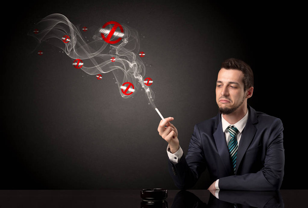 Businessman smoking concept - Фото, зображення