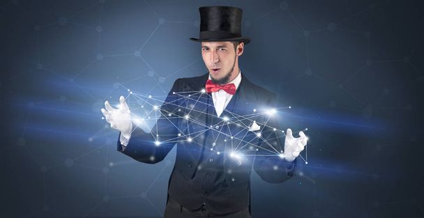 Magician with geometrical connection on his hand  - Φωτογραφία, εικόνα