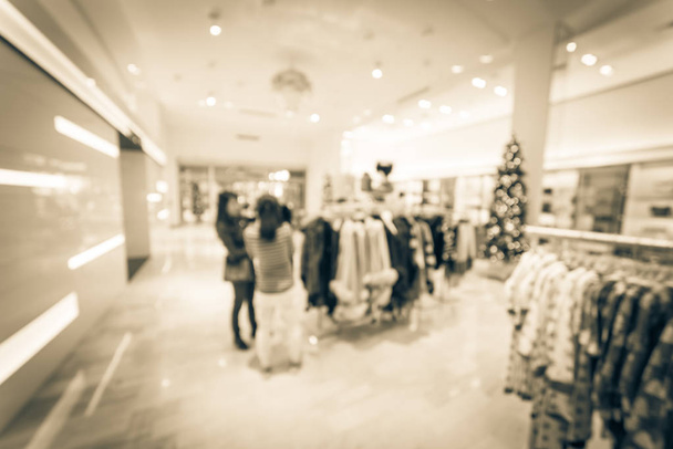 Vintage Toon wazig beweging klant winkelen bij luxe kledingwinkel in het centrum van Dallas, Texas, Usa tijdens vakantieperiode. Intreepupil dure schoenen, handtassen, juwelen, accessoires, beauty producten - Foto, afbeelding