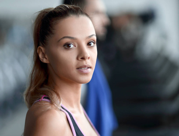 close up. attractive young woman in the gym. - 写真・画像