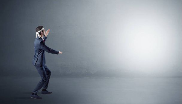 Businessman fighting in an empty space - Foto, Imagem