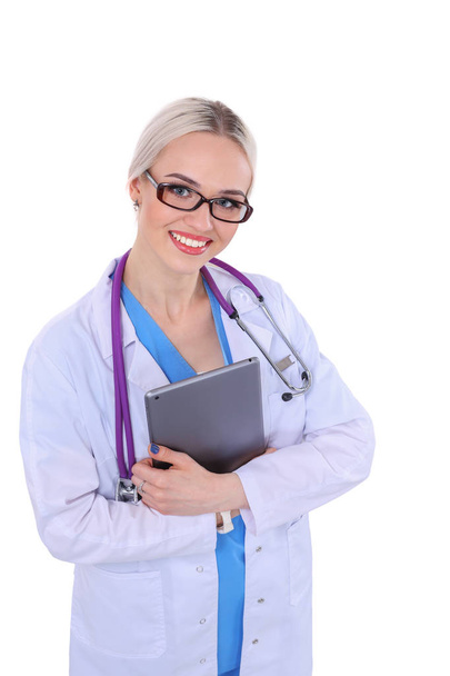 Female doctor using a digital tablet and standing on white background. Woman doctors. - Фото, изображение