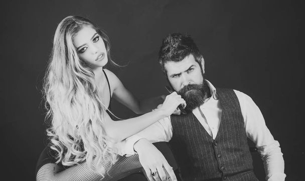 Bearded man and sexy woman with long curly hair. - 写真・画像