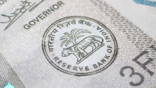 Macro primer plano de la moneda india  - Imágenes, Vídeo