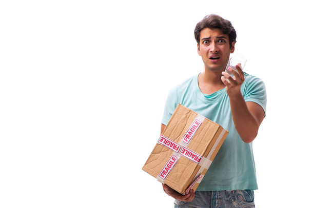 Young handsome man with fragile box ordered from Internet  - Φωτογραφία, εικόνα
