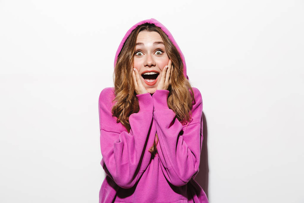 Portrait of young woman 20s wearing sweatshirt laughing isolated over white background - Photo, Image
