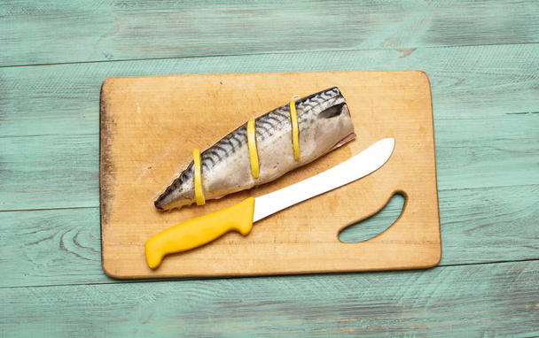 Marinating mackerel fish in the kitchen - Photo, Image