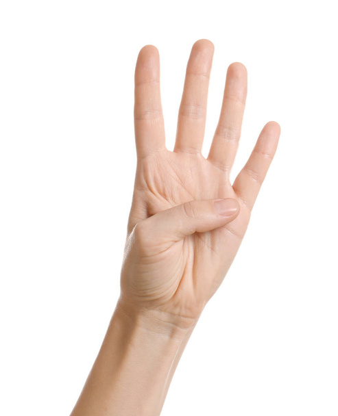 Woman showing four fingers on white background, closeup of hand - Foto, Imagen