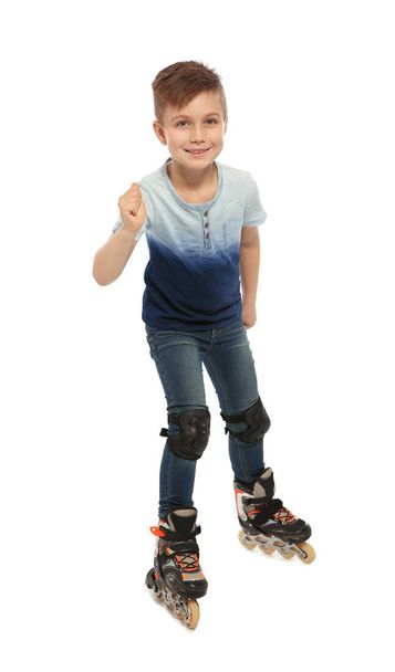 Little boy with inline roller skates on white background - Photo, image