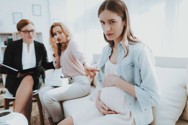 Mother with Pregnant Daughter in Doctor Office. Visit to Family Doctor. Consulting Psychologist. Healthy Pregnancy Concept. Young Mother. Worried Mother. Pregnant Girl. Psychological Help. - Photo, Image