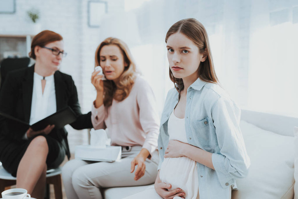 Mother with Pregnant Daughter in Doctor Office. Visit to Family Doctor. Consulting Psychologist. Healthy Pregnancy Concept. Young Mother. Worried Mother. Pregnant Girl. Psychological Help. - Fotoğraf, Görsel