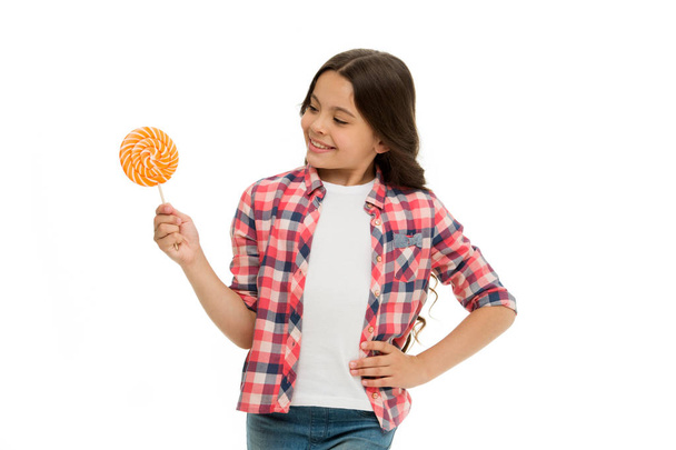 Girl smiling face hold sweet lollipop. Girl like lollipop candy isolated white background. Control nutrition of your child. Sweet tooth and food addiction. Can sugar make us happy. Sweet happiness - Zdjęcie, obraz